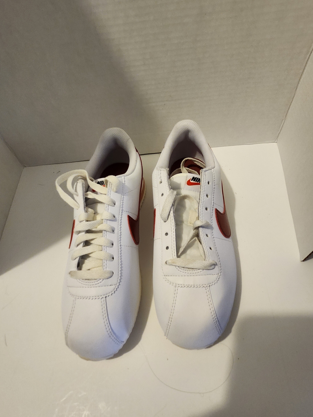 Nike Men's White Sneakers with Red Swoosh
